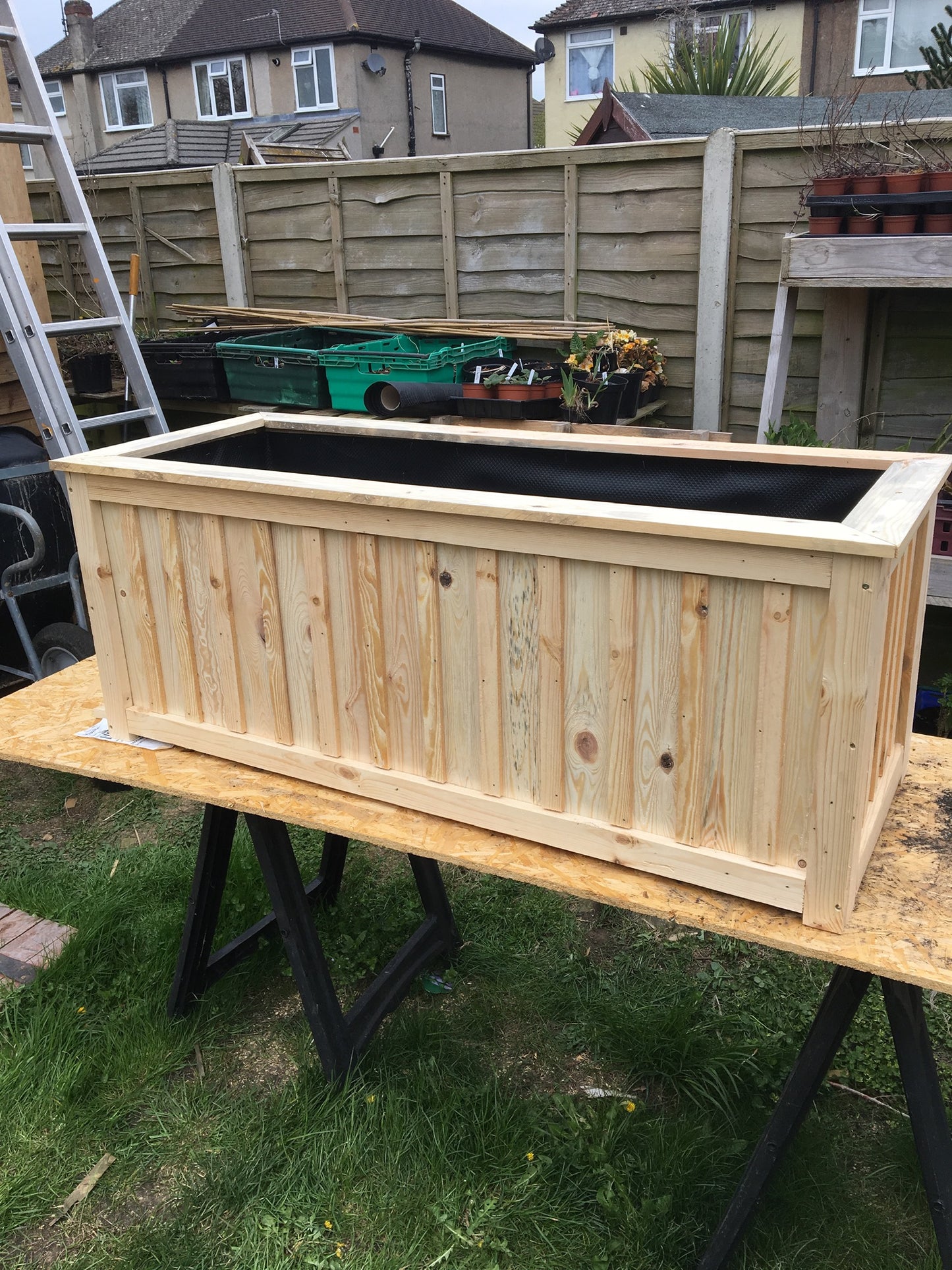 Decorative wooden trough planter