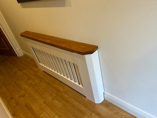 Painted radiator cover with wooden top and mitered corner