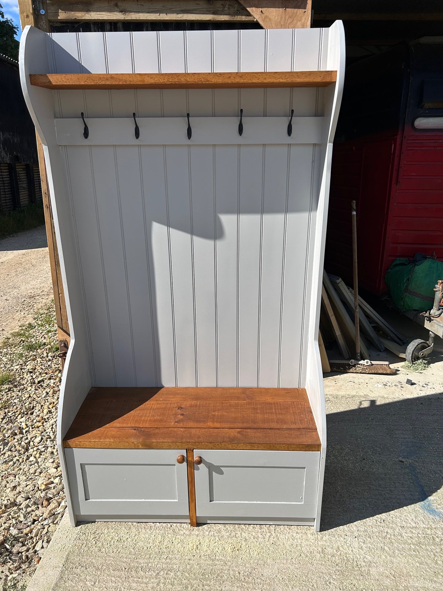 Bespoke Hallway coat unit with storage cupboard and seat